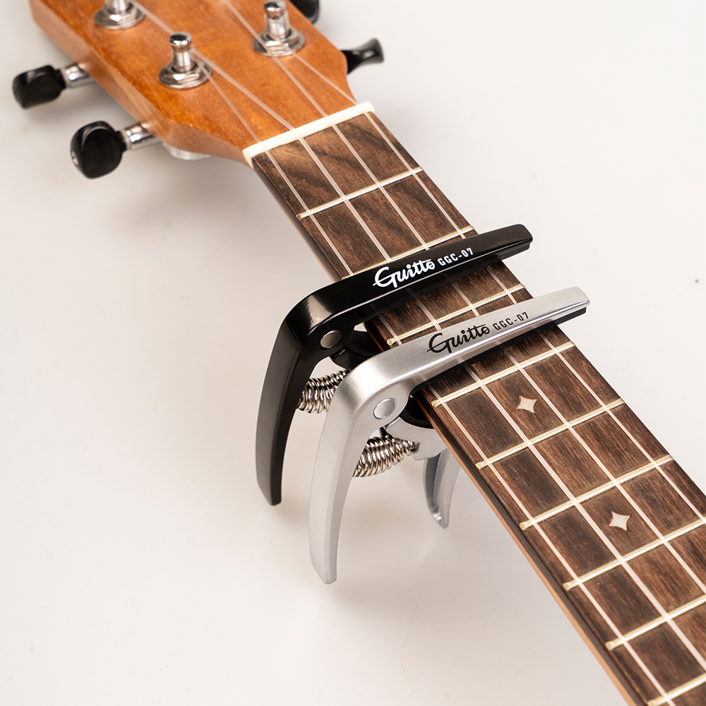 GUITTO GGC-07 Ukulele Capo Qui - Musical Instrument Organ recensione e prezzo